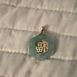Elegant Jade Pendant with Gold Accent